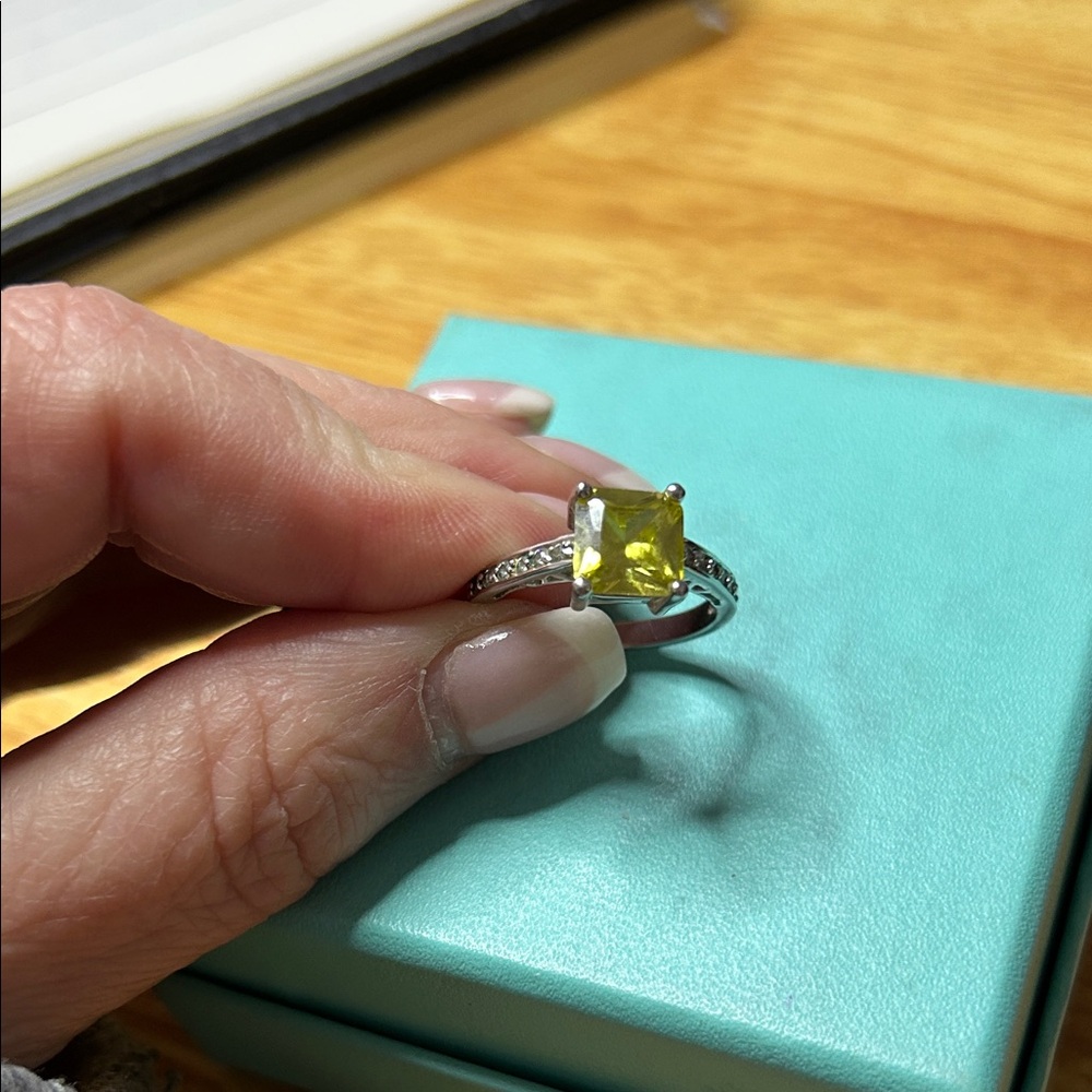Elegant Silver Ring with Yellow Gemstone